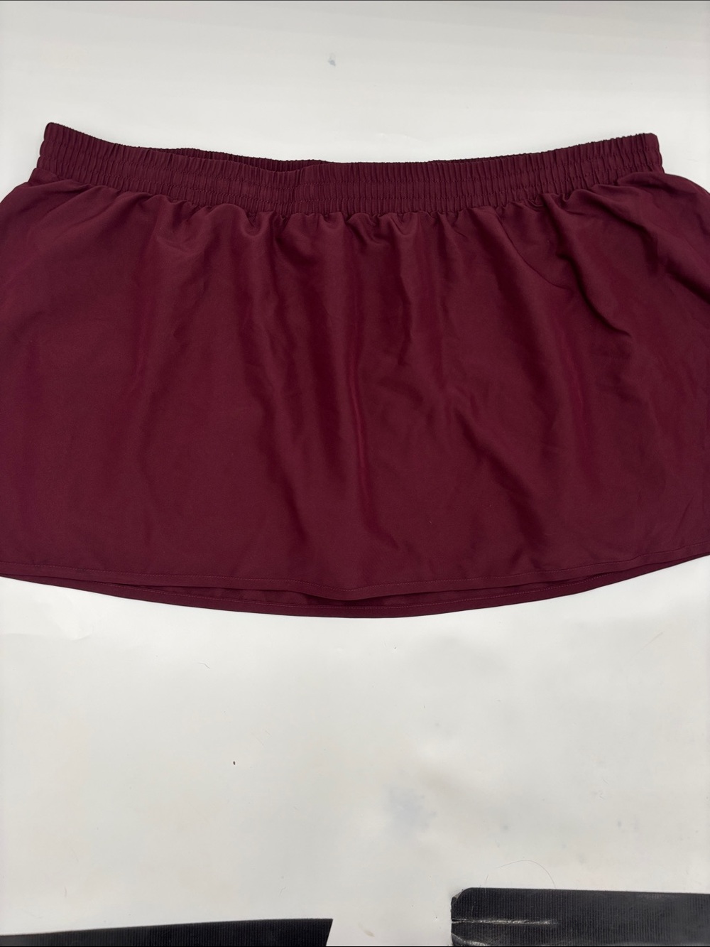 Under Armour Fly By Skort in Dark Maroon